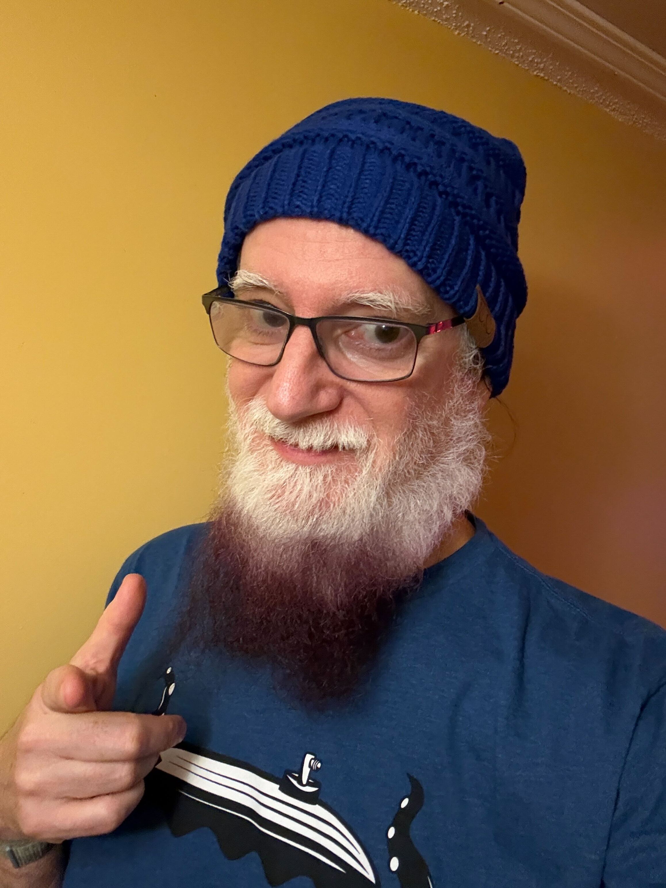 Eric Wagoner wearing a blue beanie for Blue Beanie Day 2025